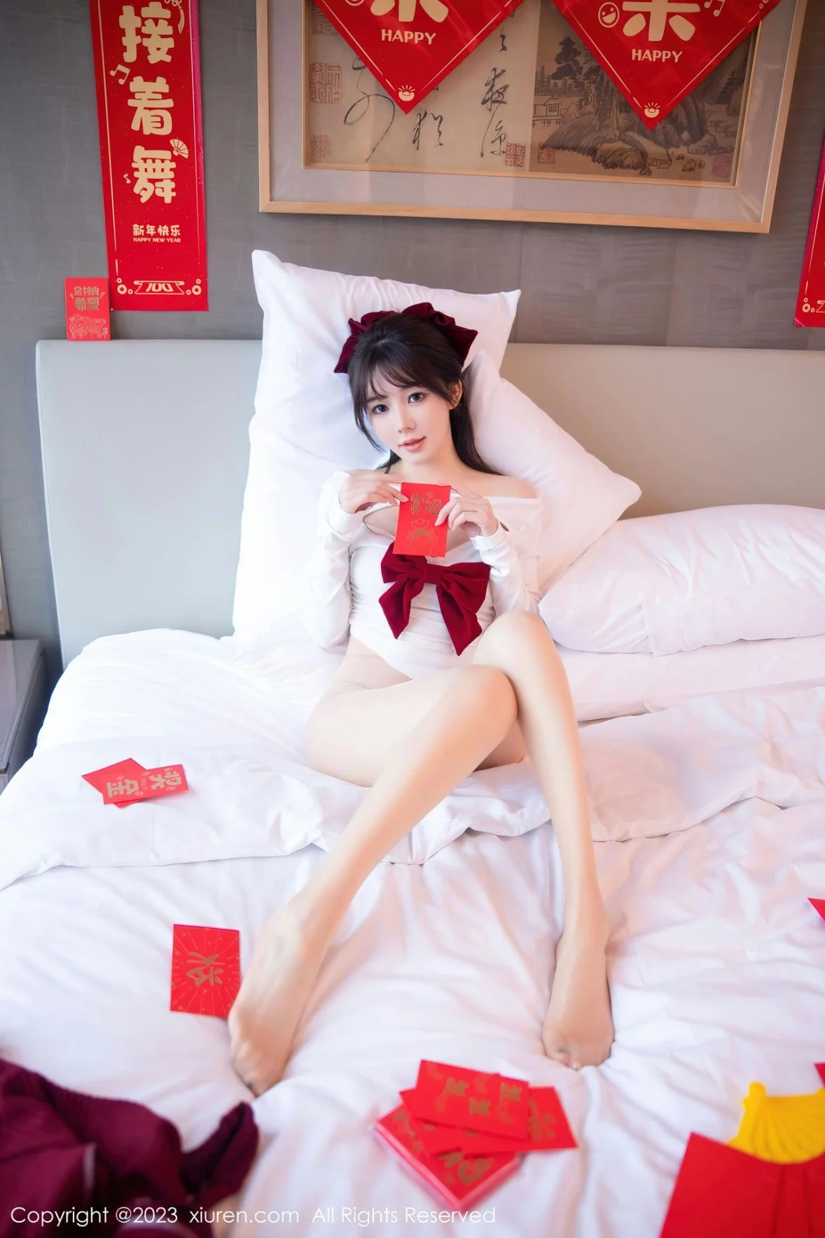 XiuRen第6168期_模特婠婠么新春主题私房床上脱低胸服饰秀绝美身材迷人诱惑写真84P