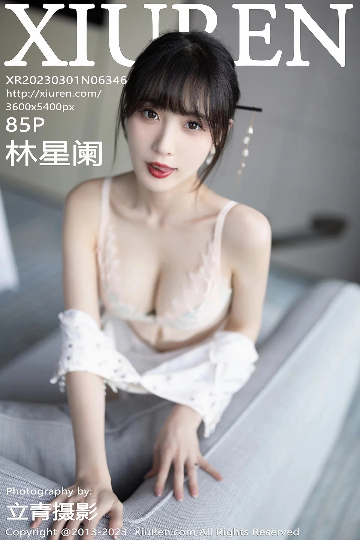 XiuRen第6346期_模特林星阑海南旅拍性感浅色短款旗袍露浅粉色蕾丝内衣迷人写真85P