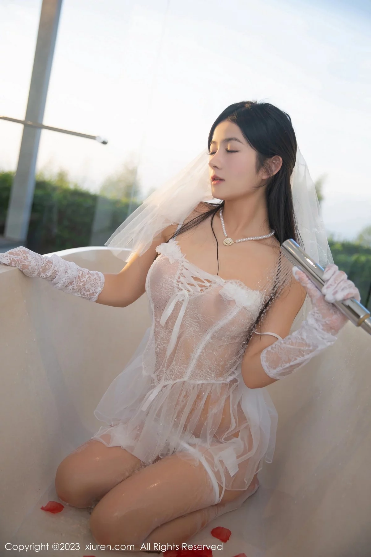 XiuRen第6994期_模特谭小灵性感白色轻透情趣婚纱配白丝袜秀惹火身材诱惑写真74P