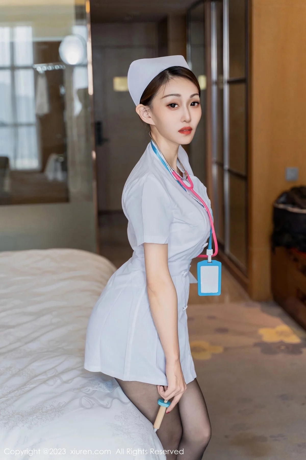 XiuRen第6971期_模特妖-Baby性感白色护士服饰配超薄黑丝秀完美身材诱惑写真67P